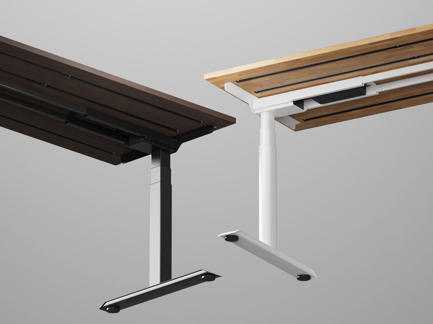幅180cmの電動式昇降デスク。天板下にノートPCなどを設置可能な拡張